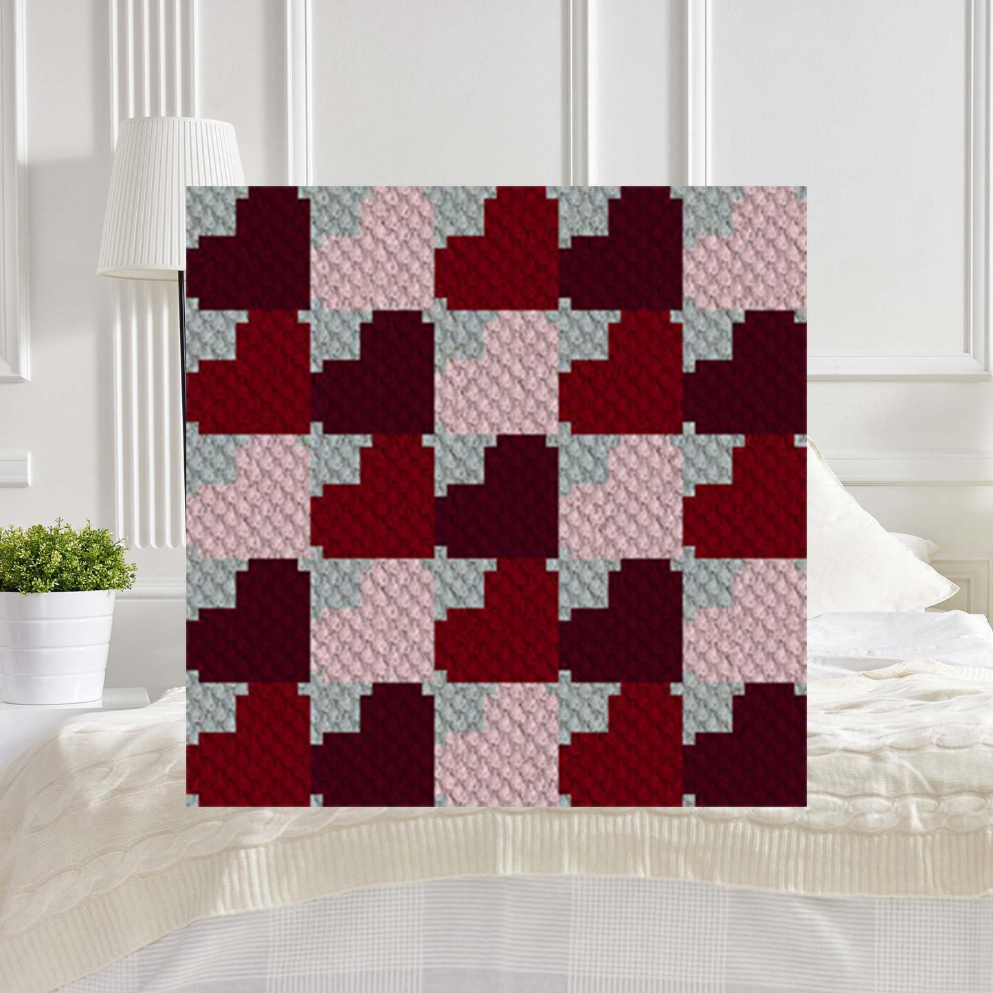 Pixel-art grid of hearts in reds, pinks, burgundy, and grey on a C2C background