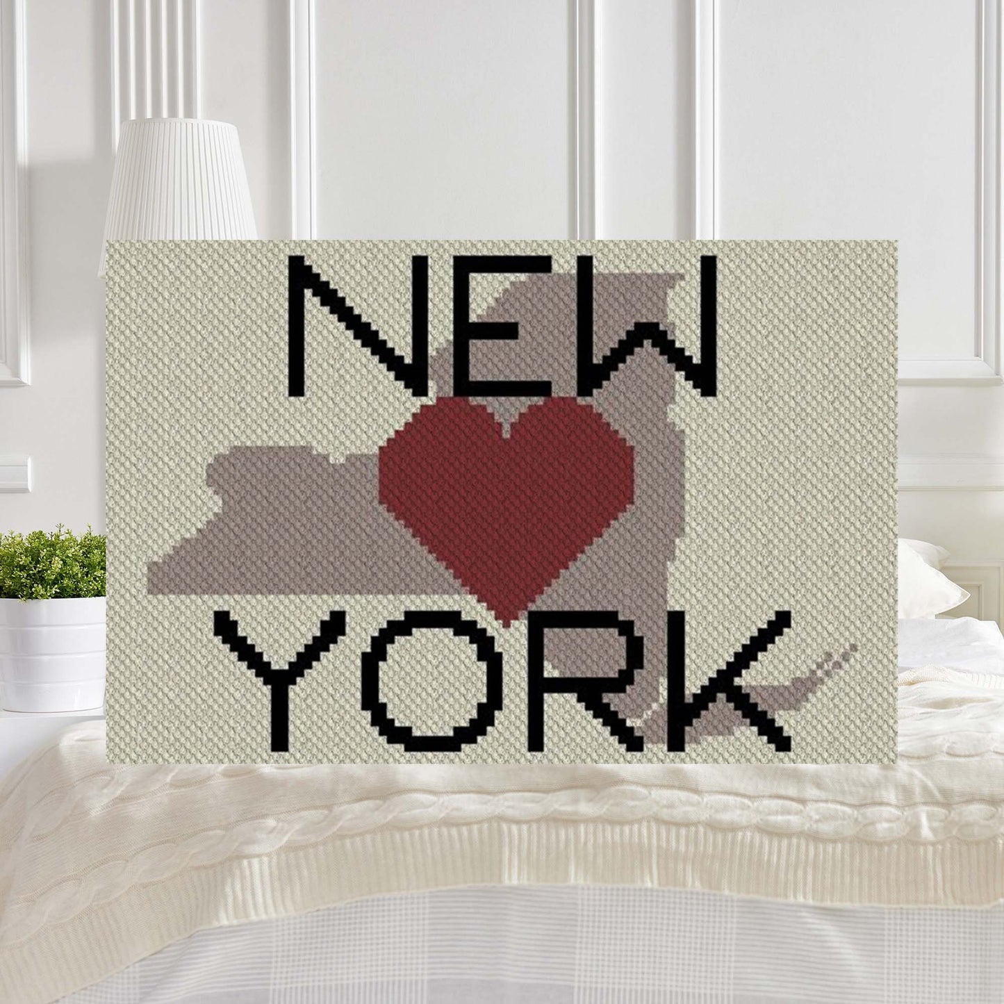 Pixel-art New York silhouette with heart and graph chart for Graphghan/cross-stitch