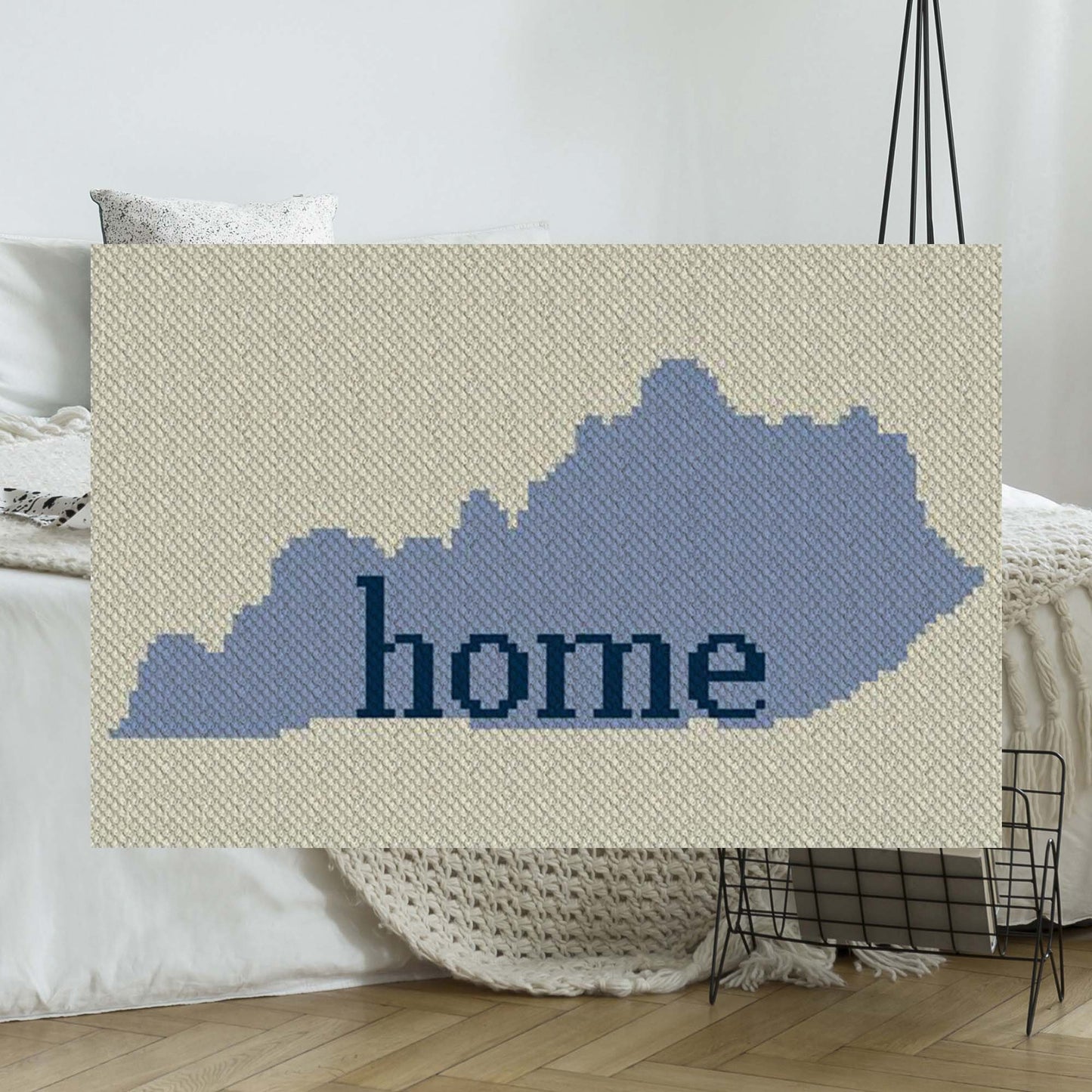 Pixel-art Kentucky outline in three coordinating yarn blocks