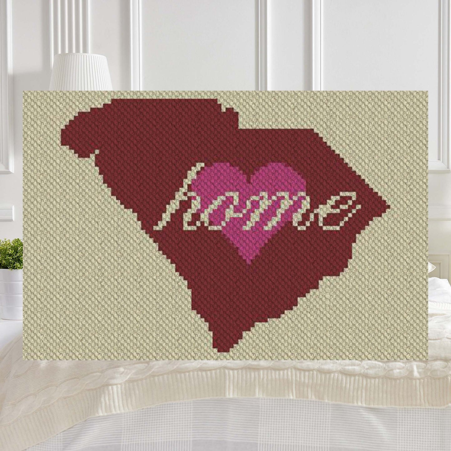 Four-color pixel-art outline of South Carolina state