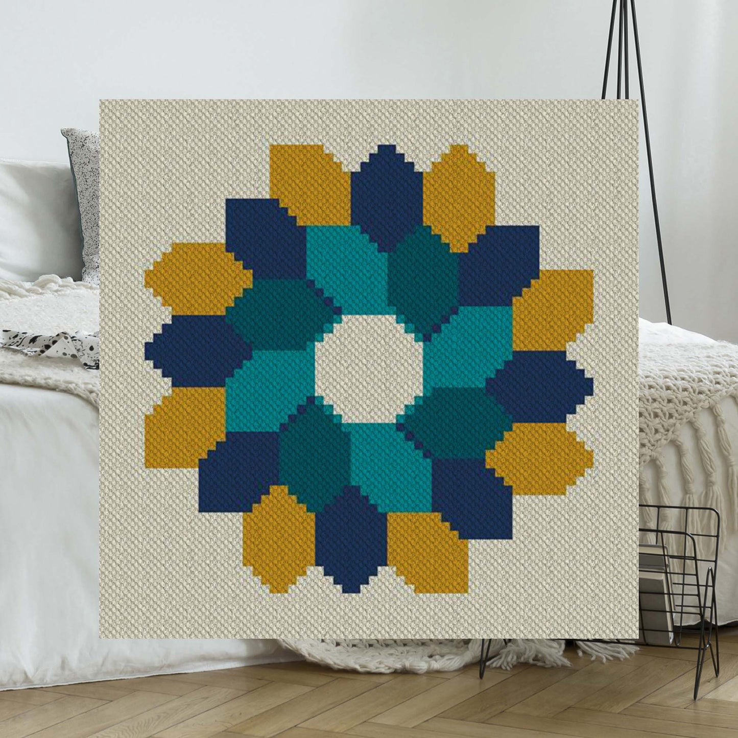 Lapghan-size C2C crochet afghan in autumn colors featuring leaves and pumpkins