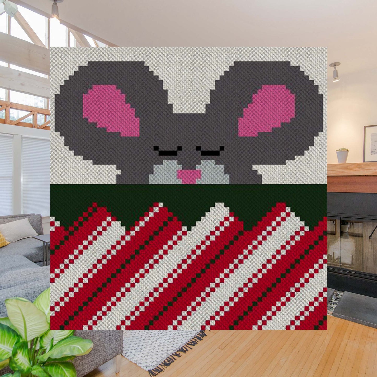 Pixel-art of a gray mouse peeking over a red-and-white striped rug, using corner-to-corner blocks