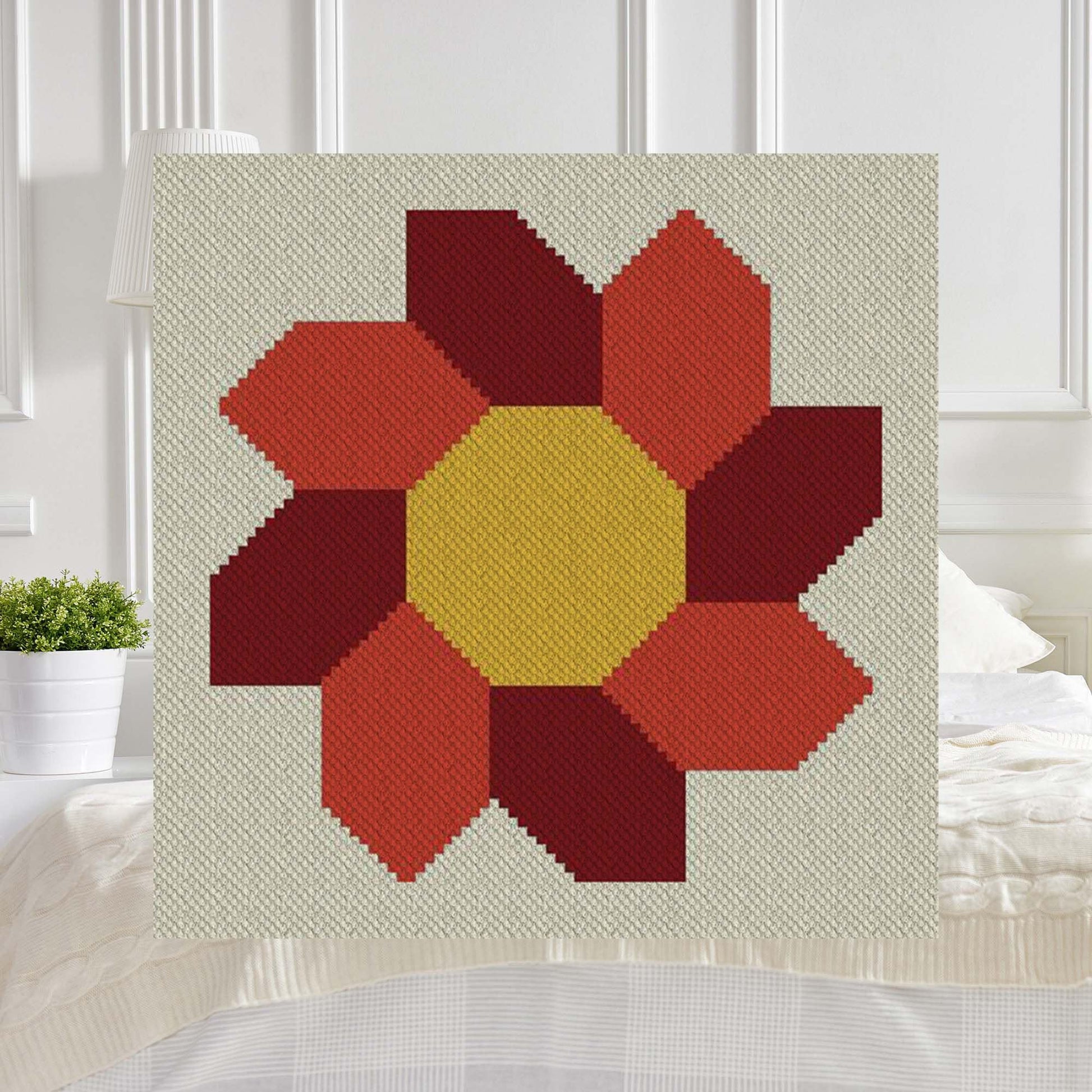 Pixel-art sunflower with golden center and rust-orange petals on a cream background