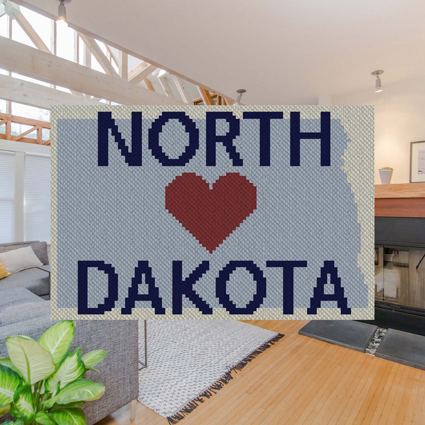 Pixel-art North Dakota outline with heart motif and graph for Graphghan/cross-stitch