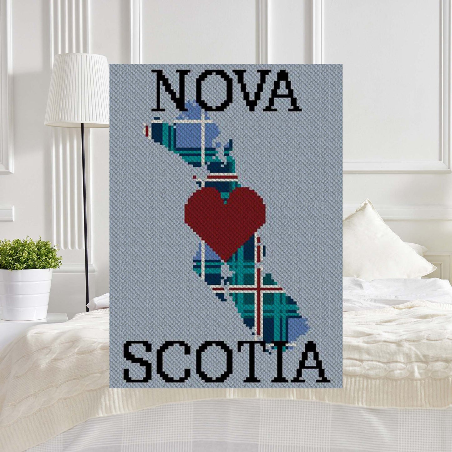 Pixel-art Nova Scotia outline with plaid heart motif in twin-size layout