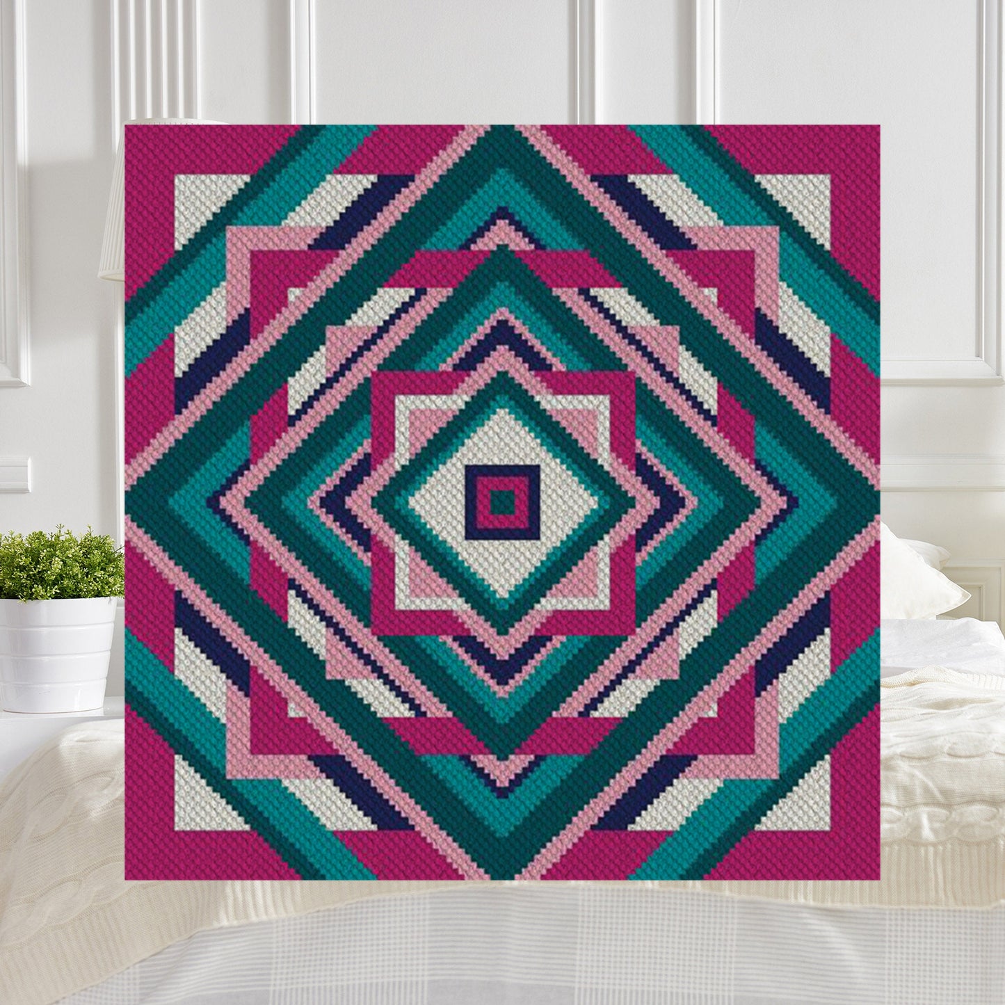 Large queen-size afghan with regal motifs, shown in C2C diagonal blocks and chart overlays