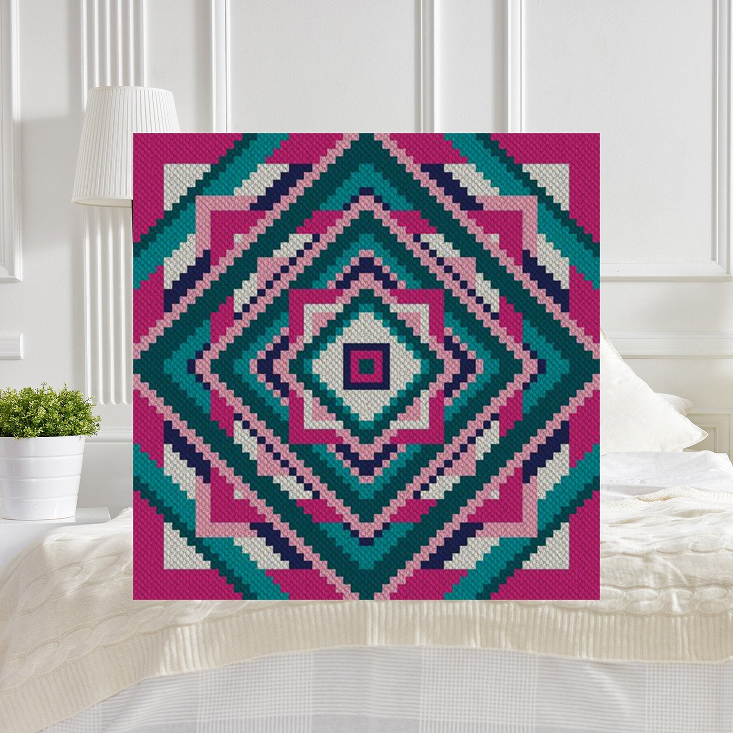 Vibrant lapghan with square motif design in contrasting yarn colors for a playful throw