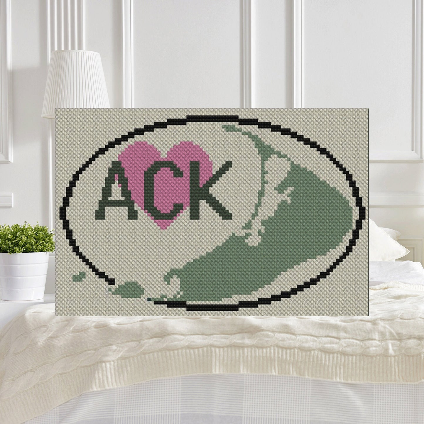 Pixel-art Nantucket silhouette with ACK†letters and a bold heart motif