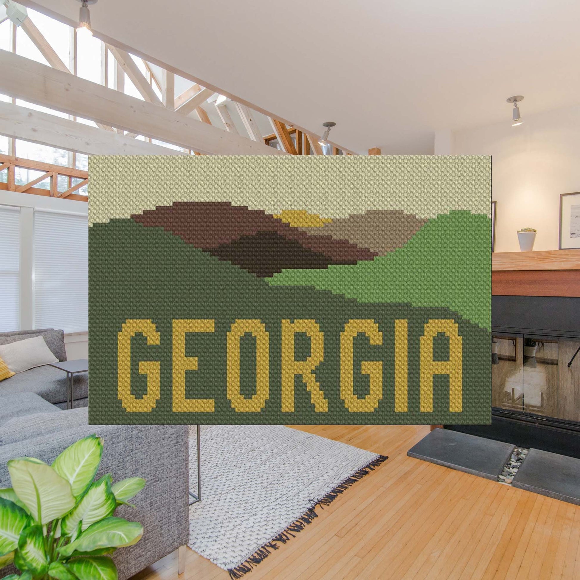 Pixel-art peaks in shades of green, purple, blue, and pink with GEORGIA†spelled beneath