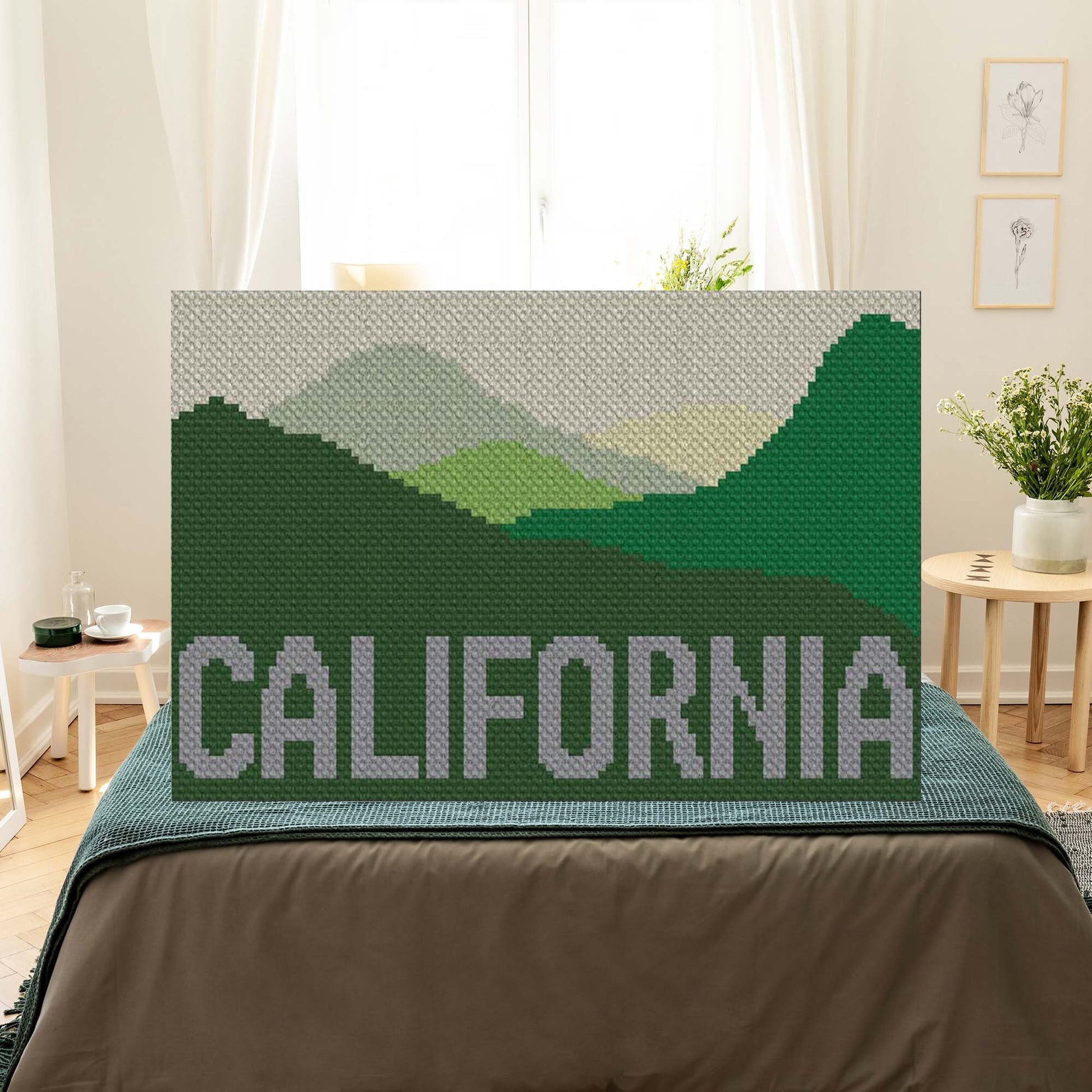Pixel-art mountain landscape in purples, pinks, greens, and blues capturing California's peaks